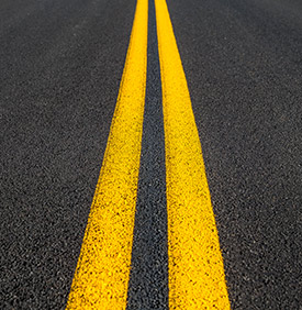 parallel yellow stripes on road
