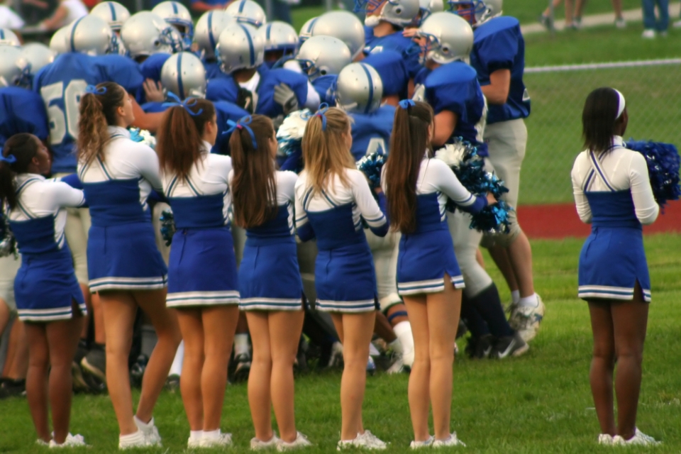 Cheerleaders at a high school football game